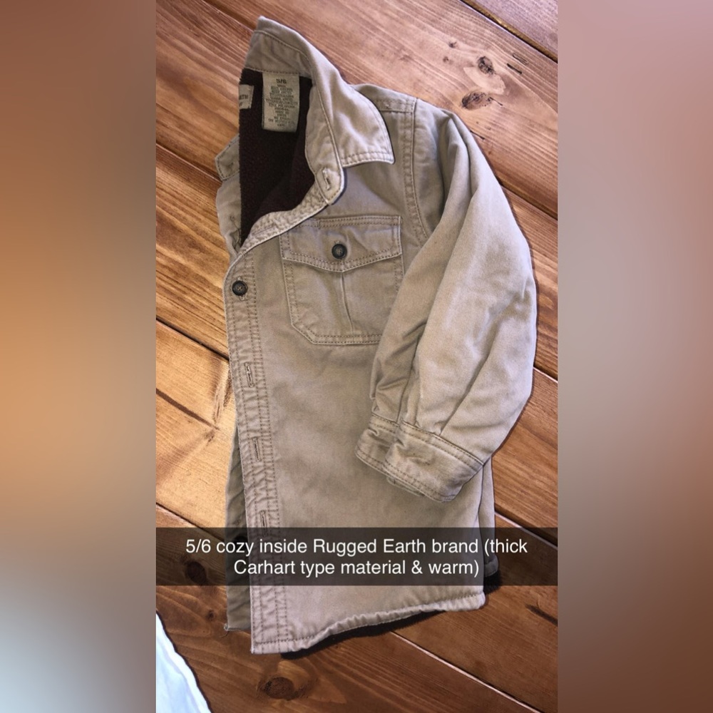 Rugged Earth 5/6 corduroy type jacket with warm inside. See small stain in pic.
